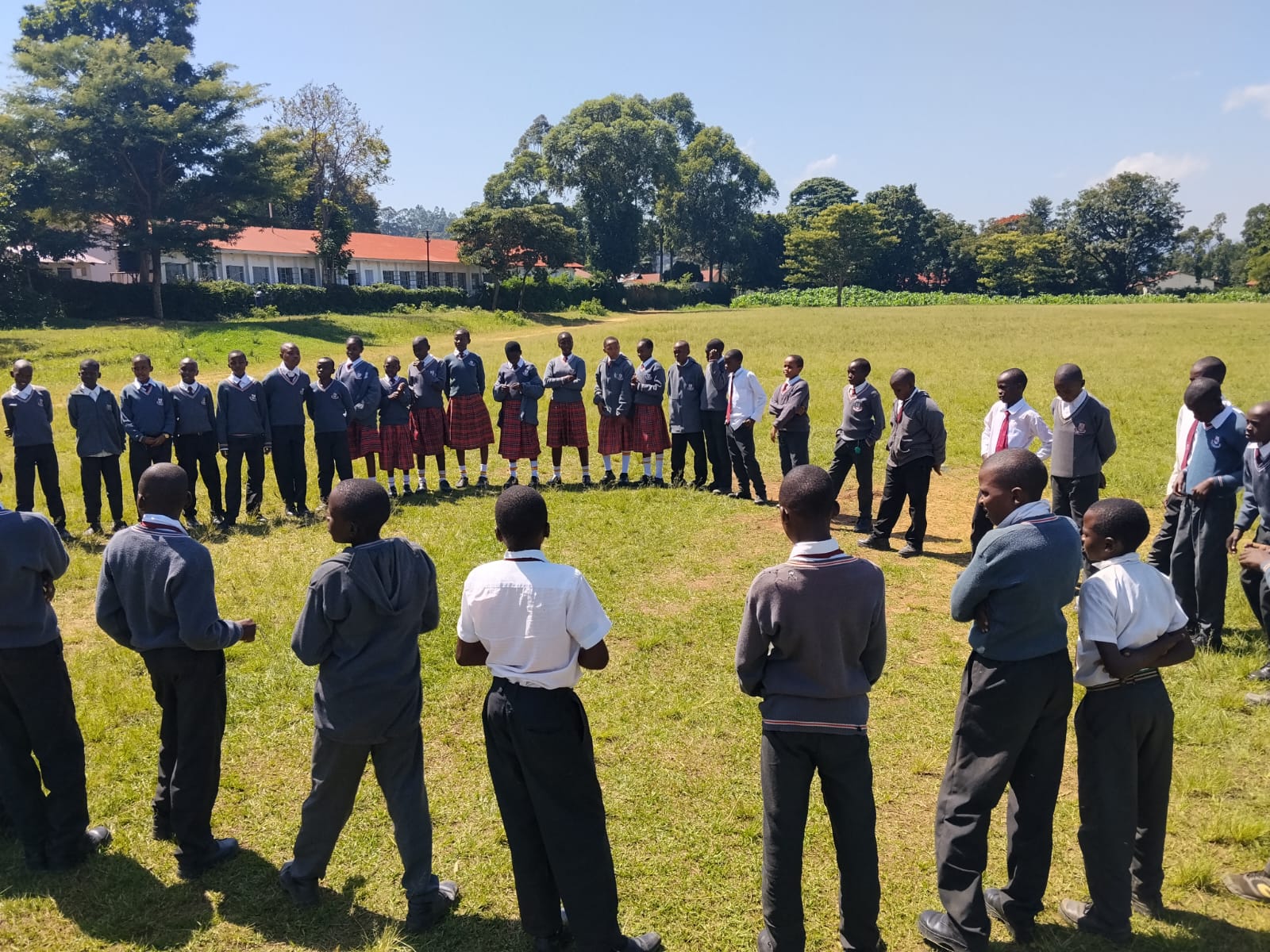 Adults gathered for a teaching and conversation circle
